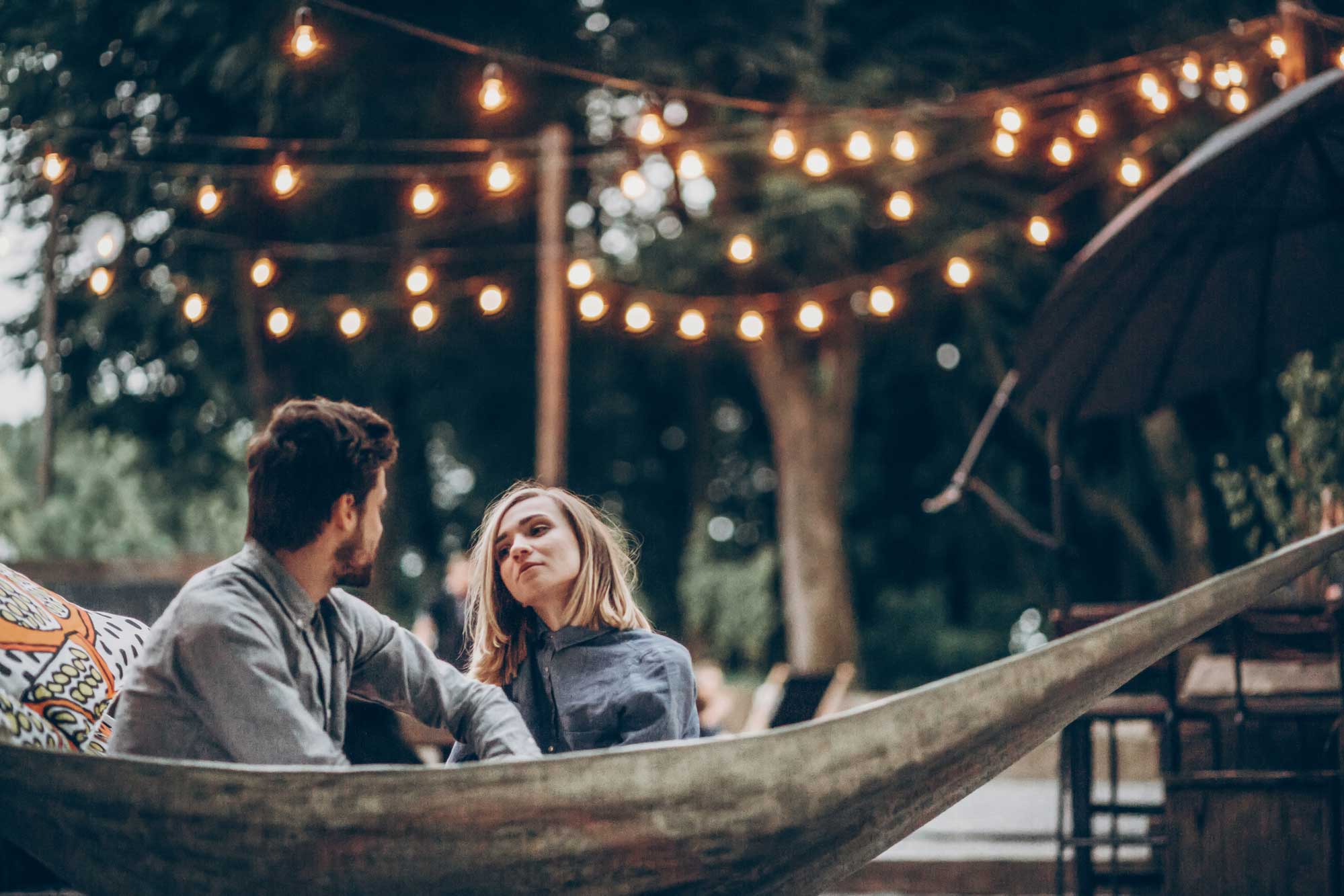 Couple sharing cocktails on a date night